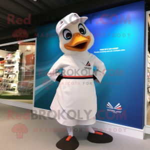 White Swan mascot costume character dressed with a Board Shorts and Caps