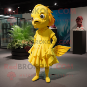 Yellow Betta Fish mascot costume character dressed with a Shift Dress and Shoe clips