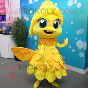 Yellow Betta Fish mascot costume character dressed with a Shift Dress and Shoe clips