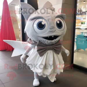 Gray Fish Tacos mascot costume character dressed with a Wedding Dress and Bow ties