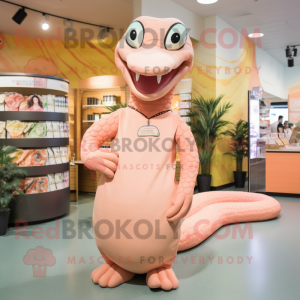 Peach Titanoboa mascot costume character dressed with a Sheath Dress and Lapel pins