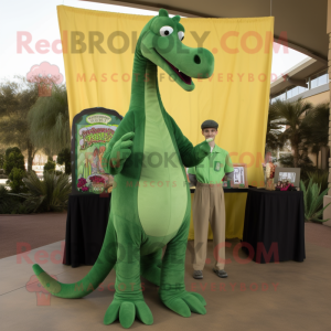 Green Brachiosaurus mascot costume character dressed with a Corduroy Pants and Earrings