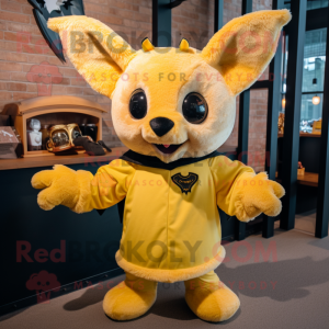Yellow Bat mascot costume character dressed with a Henley Tee and Mittens