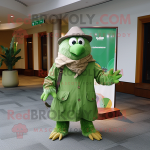 Green Kiwi mascot costume character dressed with a Raincoat and Pocket squares