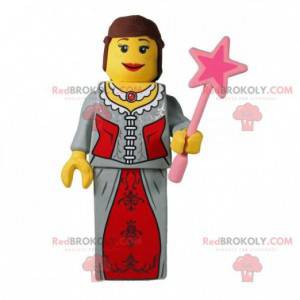 Lego maskot kledd som en eventyrprinsesse med en tryllestav -