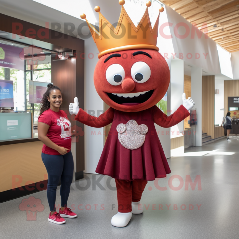 Maroon Queen mascot costume character dressed with a Capri Pants and Messenger bags