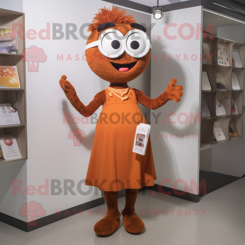 Rust Juggle mascot costume character dressed with a Shift Dress and Reading glasses Rust Juggle mascot costume character dressed with a Shift Dress and Reading glasses