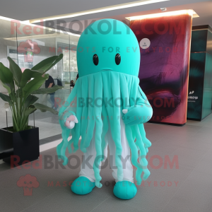 Turquoise Jellyfish mascot costume character dressed with a Long Sleeve Tee and Handbags