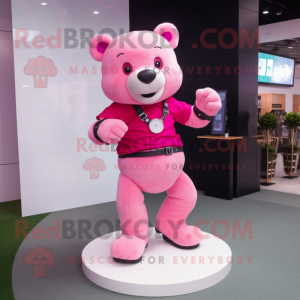 Pink Bear mascot costume character dressed with a Polo Tee and Bracelet watches