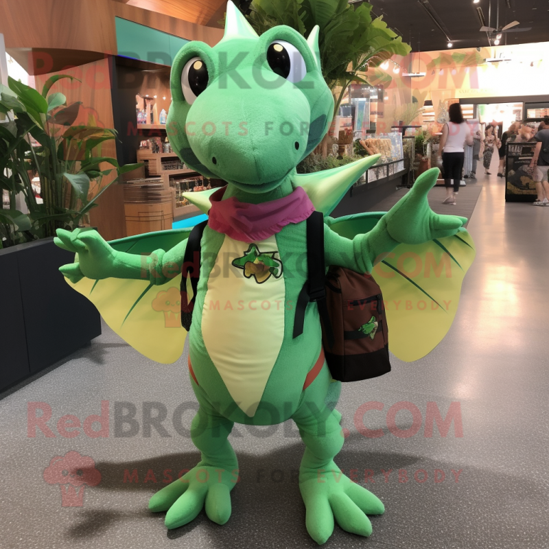 Green Pterodactyl mascot costume character dressed with a V-Neck Tee and Backpacks Green Pterodactyl mascot costume character dressed with a V-Neck Tee and Backpacks