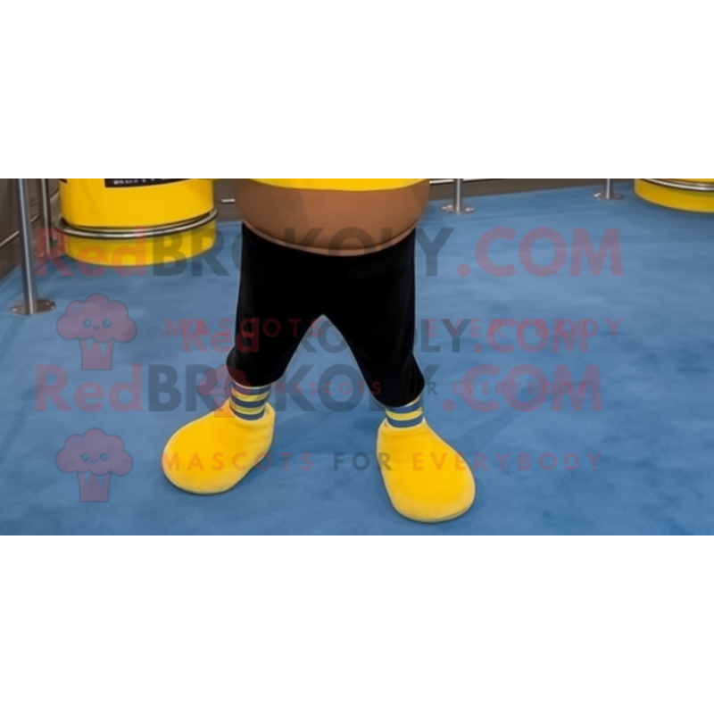 Yellow Boxing Glove mascot costume character dressed with a Sweatshirt and Anklets Yellow Boxing Glove mascot costume character dressed with a Sweatshirt and Anklets