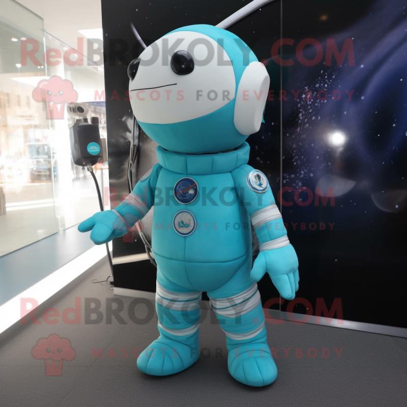 Teal Astronaut mascot costume character dressed with a Playsuit and Shawls