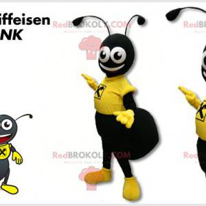 Czarna maskotka mrówka ubrana na żółto - Redbrokoly.com