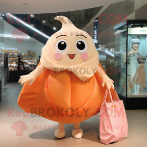 Peach Stingray mascot costume character dressed with a Mini Dress and Tote bags