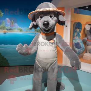 Gray Dog mascot costume character dressed with a Swimwear and Caps