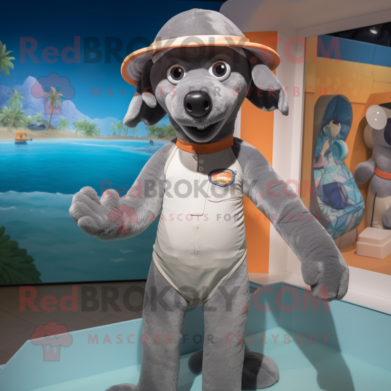 Gray Dog mascot costume character dressed with a Swimwear and Caps