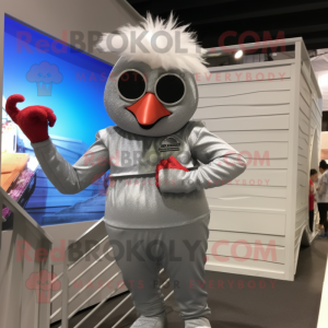 Silver Chicken Parmesan mascot costume character dressed with a Swimwear and Gloves