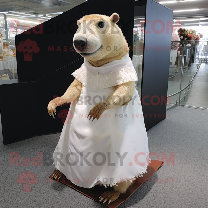 Cream Capybara mascot costume character dressed with a Wedding Dress and Foot pads Cream Capybara mascot costume character dressed with a Wedding Dress and Foot pads