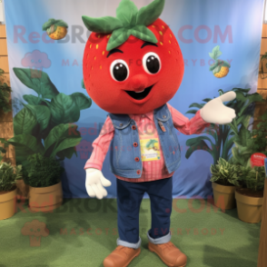 Red Strawberry mascot costume character dressed with a Chambray Shirt and Necklaces