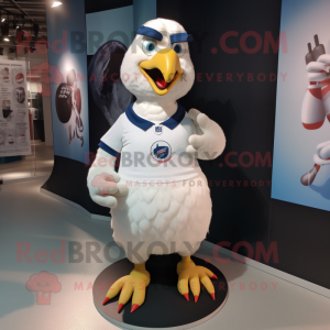 Cream Pigeon mascot costume character dressed with a Rugby Shirt and Rings