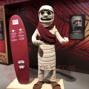 Maroon Mummy mascot costume character dressed with a Board Shorts and Lapel pins