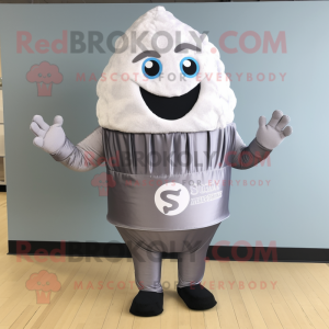 Silver Cupcake mascot costume character dressed with a Swimwear and Shoe clips