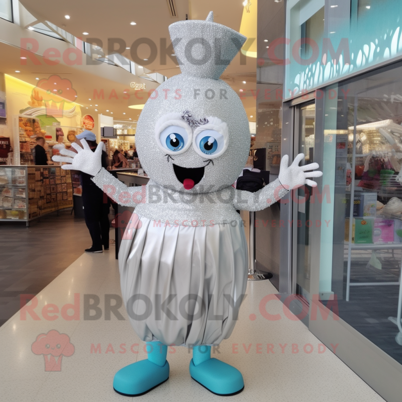 Silver Cupcake mascot costume character dressed with a Swimwear and Shoe clips Silver Cupcake mascot costume character dressed with a Swimwear and Shoe clips