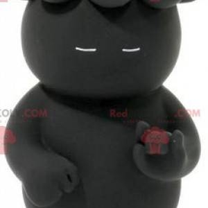 Mascot zwarte imp met welpen op het hoofd - Redbrokoly.com