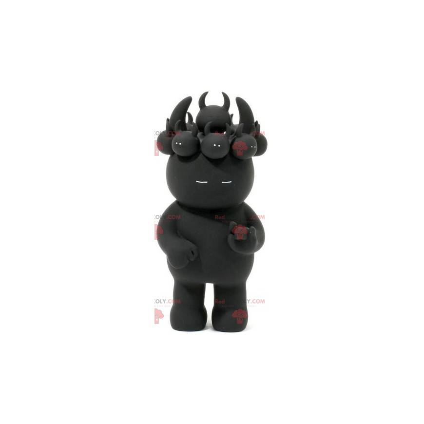 Mascotte diavoletto nero con cuccioli sulla testa -