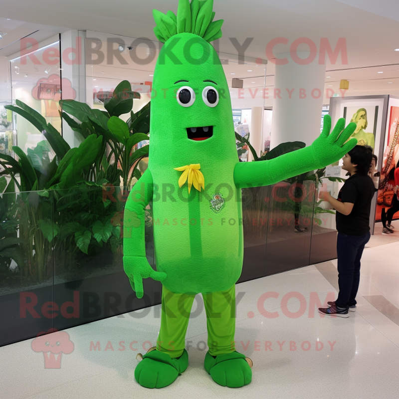 Green Carrot mascot costume character dressed with a Flare Jeans and Bracelet watches Green Carrot mascot costume character dressed with a Flare Jeans and Bracelet watches