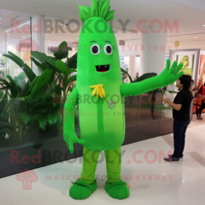 Green Carrot mascot costume character dressed with a Flare Jeans and Bracelet watches