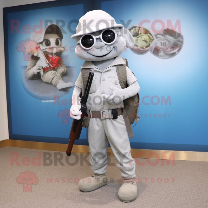 Silver Sniper mascot costume character dressed with a V-Neck Tee and Messenger bags