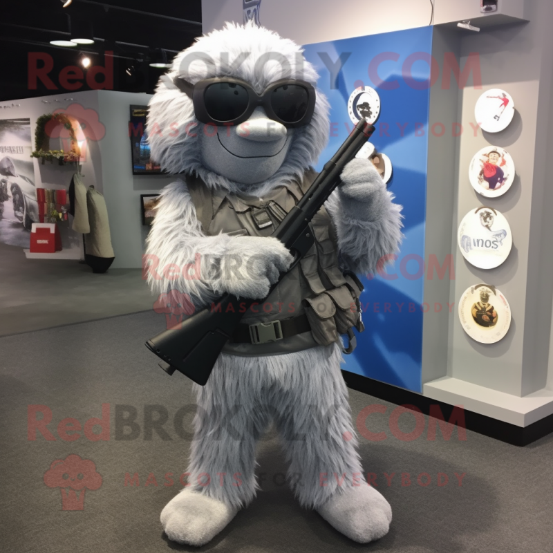 Silver Sniper mascot costume character dressed with a V-Neck Tee and Messenger bags Silver Sniper mascot costume character dressed with a V-Neck Tee and Messenger bags