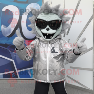 Silver Demon mascot costume character dressed with a Windbreaker and Sunglasses