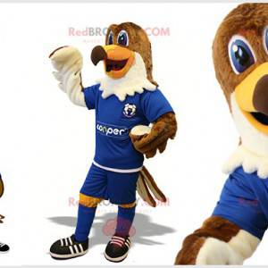 Brown and white eagle mascot in footballer outfit -