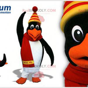 Mascote pinguim preto e branco com uma tampa colorida -