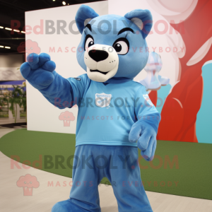 Sky Blue Puma mascot costume character dressed with a Polo Shirt and Gloves
