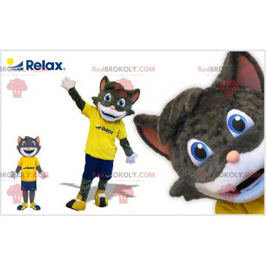 Graues und weißes Katzenmaskottchen in Sportbekleidung -