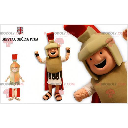 Mascote do gladiador vestido com uma roupa bege e vermelha -