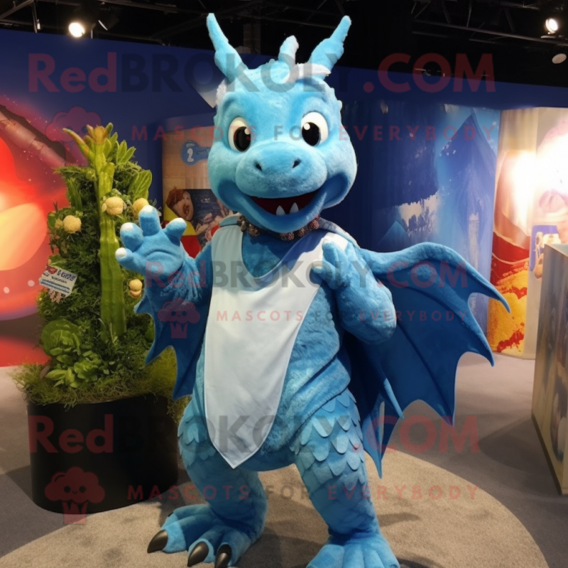 Sky Blue Dragon mascot costume character dressed with a Playsuit and Shawl pins Sky Blue Dragon mascot costume character dressed with a Playsuit and Shawl pins