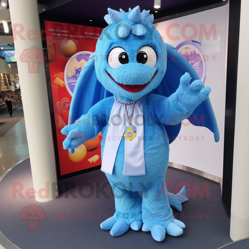 Sky Blue Dragon mascot costume character dressed with a Playsuit and Shawl pins