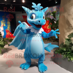 Sky Blue Dragon mascot costume character dressed with a Playsuit and Shawl pins