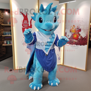 Sky Blue Dragon mascot costume character dressed with a Playsuit and Shawl pins