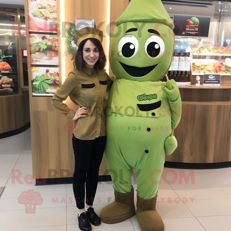 Olive Steak mascot costume character dressed with a Jumpsuit and Hair clips Olive Steak mascot costume character dressed with a Jumpsuit and Hair clips