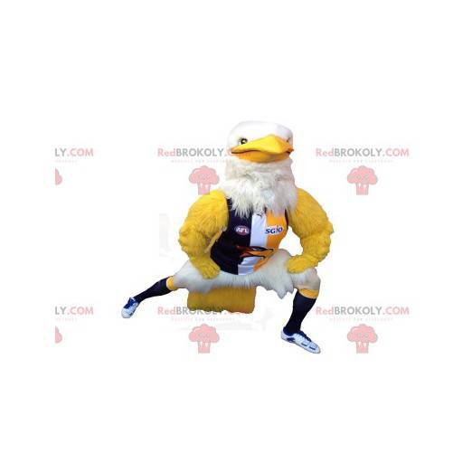 Muscular white and yellow eagle mascot in sportswear -