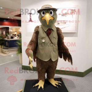 Olive Eagle mascot costume character dressed with a Corduroy Pants and Caps