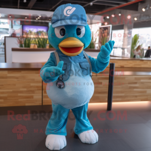 Turquoise Gosling mascot costume character dressed with a Dungarees and Caps