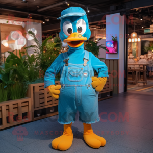 Turquoise Gosling mascot costume character dressed with a Dungarees and Caps