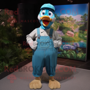 Turquoise Gosling mascot costume character dressed with a Dungarees and Caps