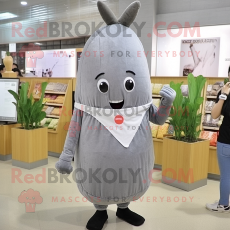 Gray Radish mascot costume character dressed with a Sheath Dress and Keychains Gray Radish mascot costume character dressed with a Sheath Dress and Keychains
